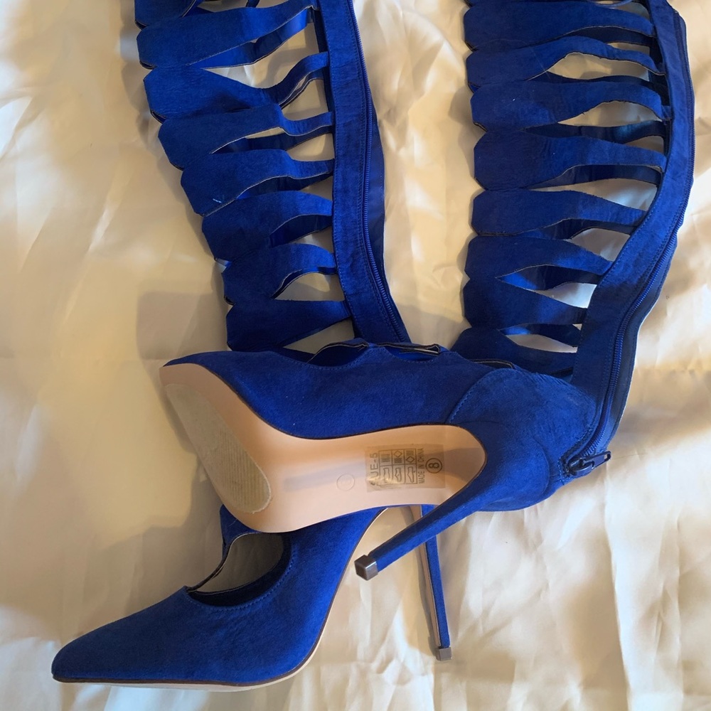 Blue thigh high boots